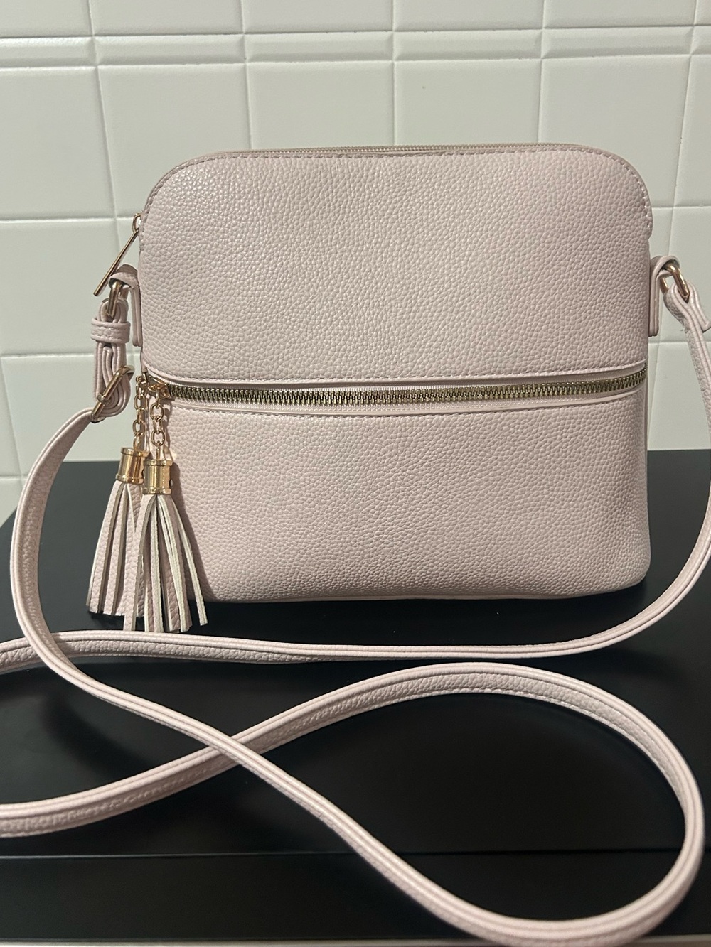 Amazon Light Pink Pebbled Crossbody Bag with Tassel Charms